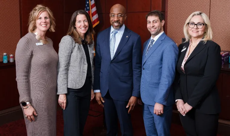 Y staff with Senator Reverend Raphael Warnock