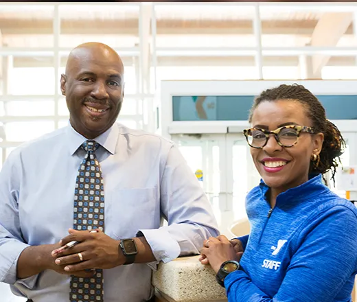 2 association employees having a conversation