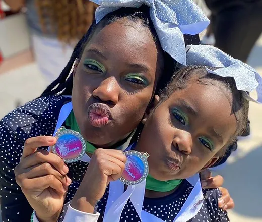 Cheerleaders with medals