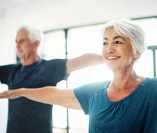 Senior adults doing posture exercises
